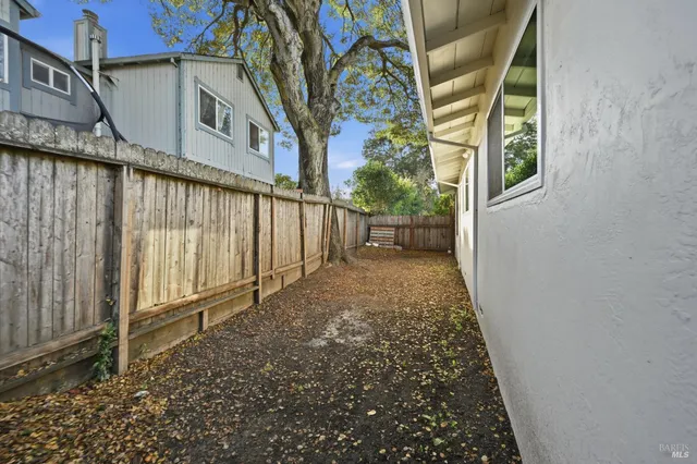 a view of a house with a street