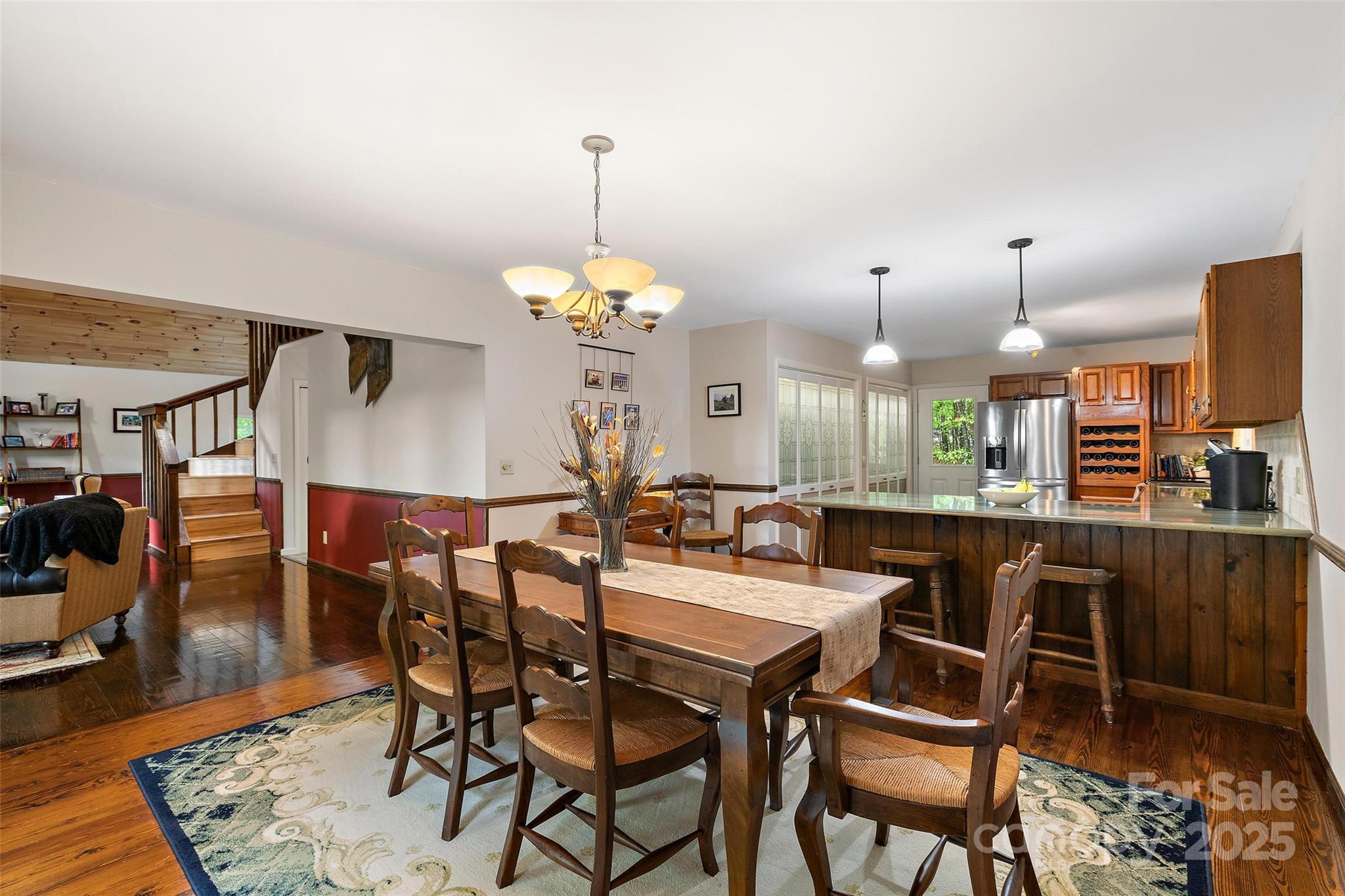 331 Pinnacle Ridge Road Beech Mountain, NC 28604 - Photo 13 of 24 a dining area with a table and chairs