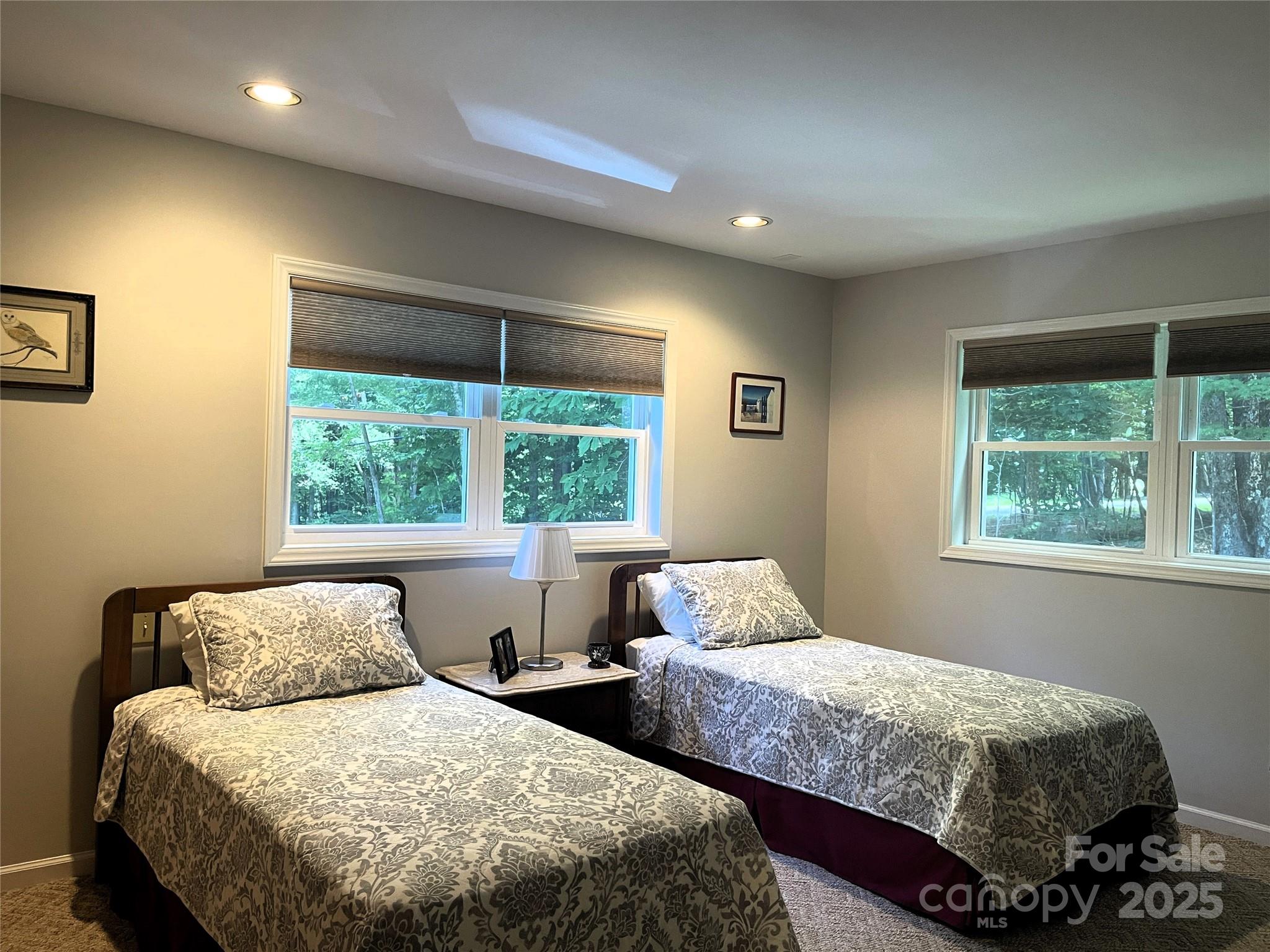 331 Pinnacle Ridge Road Beech Mountain, NC 28604 - Photo 16 of 24 a bedroom with bed and window
