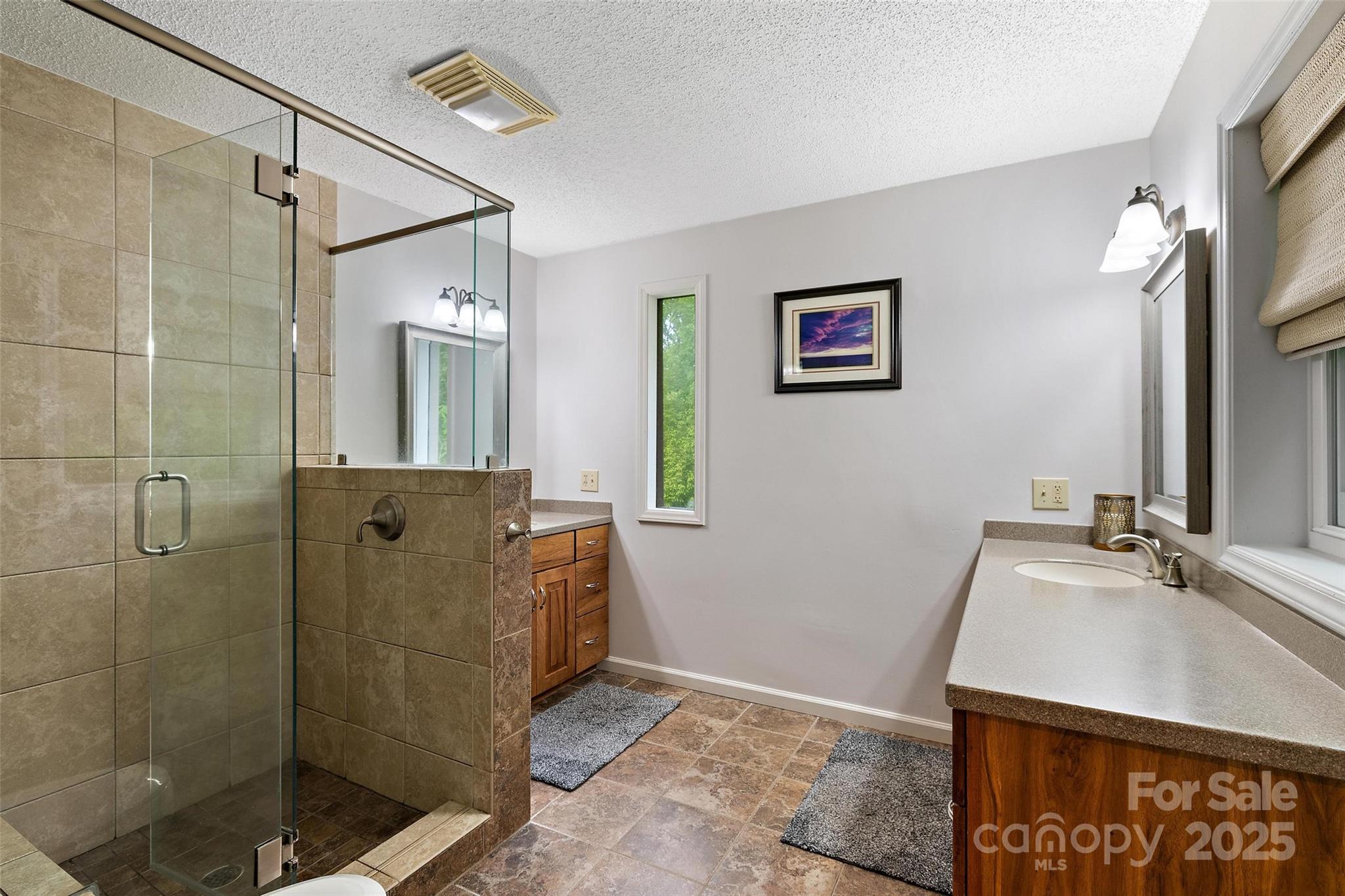 331 Pinnacle Ridge Road Beech Mountain, NC 28604 - Photo 22 of 24 a bathroom with a sink and a mirror