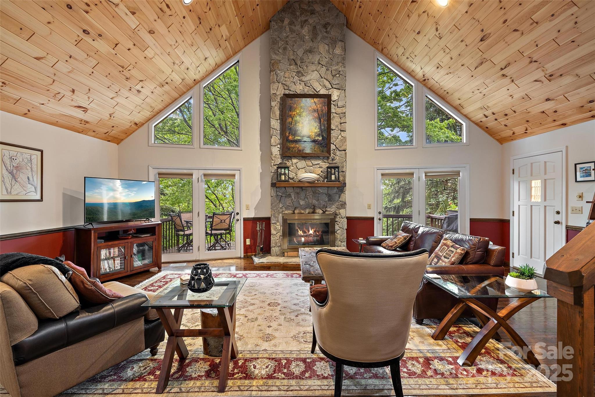 331 Pinnacle Ridge Road Beech Mountain, NC 28604 - Photo 7 of 24 a living room with fireplace furniture and a large window