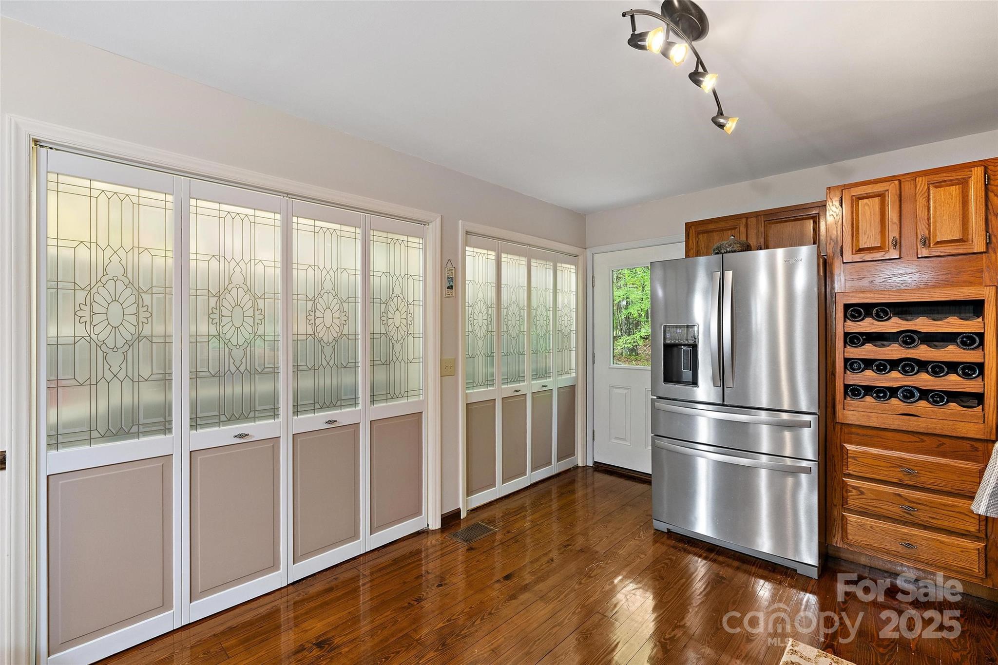 331 Pinnacle Ridge Road Beech Mountain, NC 28604 - Photo 9 of 24 a kitchen with stainless steel appliances a refrigerator and window