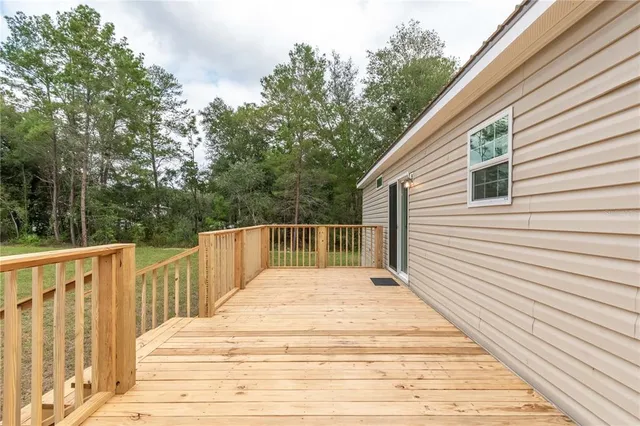 a view of a bench in a backyard