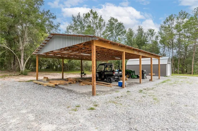 a view of a yard with of trees