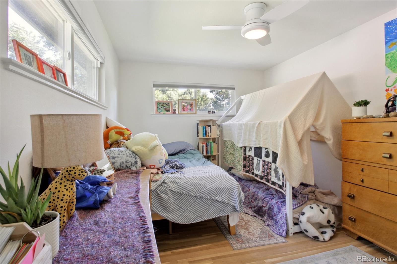 7130 West 30th Avenue Wheat Ridge, CO 80033 - Photo 22 of 37 a living room with furniture and a couch