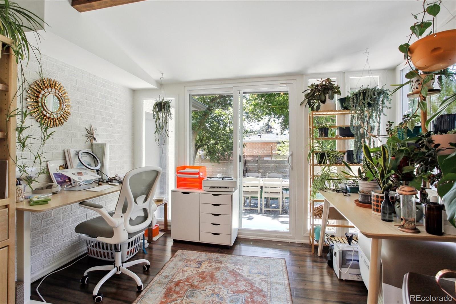 7130 West 30th Avenue Wheat Ridge, CO 80033 - Photo 23 of 37 a view of a room with workspace and a window