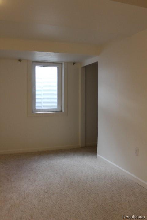 7130 West 30th Avenue Wheat Ridge, CO 80033 - Photo 31 of 37 an empty room with windows