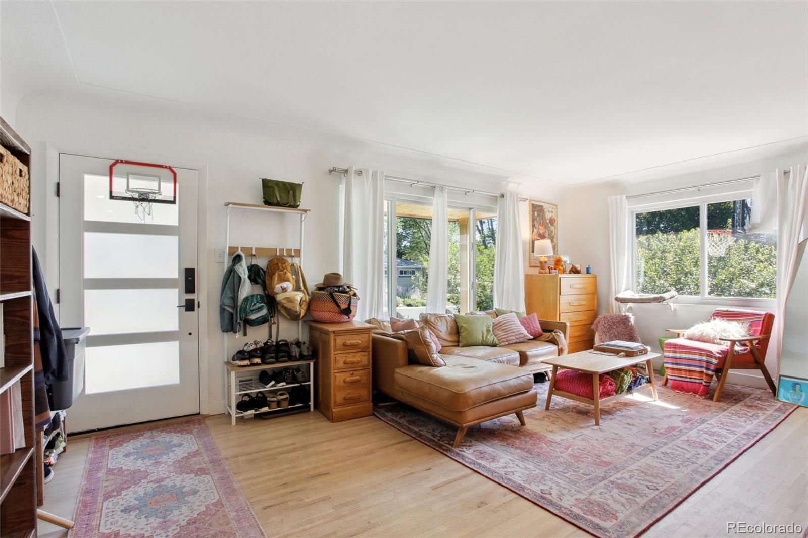 7130 West 30th Avenue Wheat Ridge, CO 80033 - Photo 5 of 37 a living room with furniture and a window