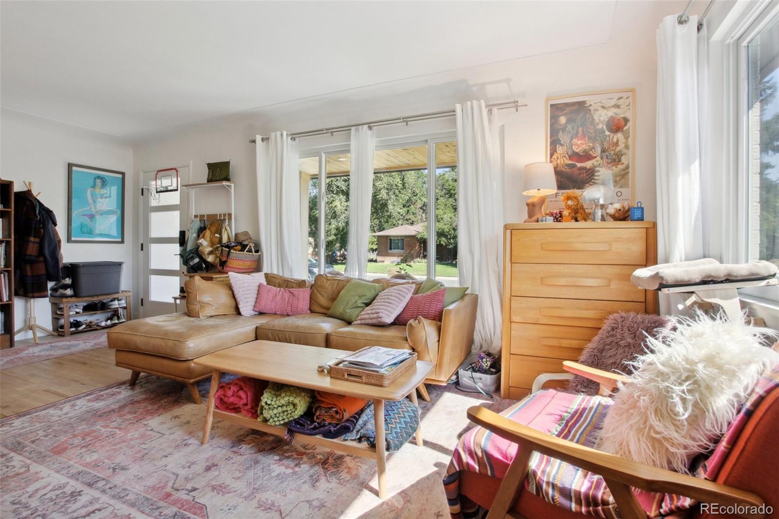 7130 West 30th Avenue Wheat Ridge, CO 80033 - Photo 6 of 37 a living room with furniture and a window