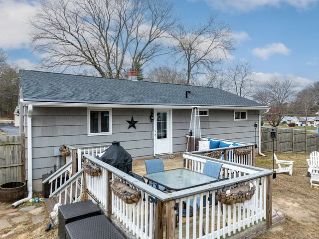 an aerial view of residential building with green space