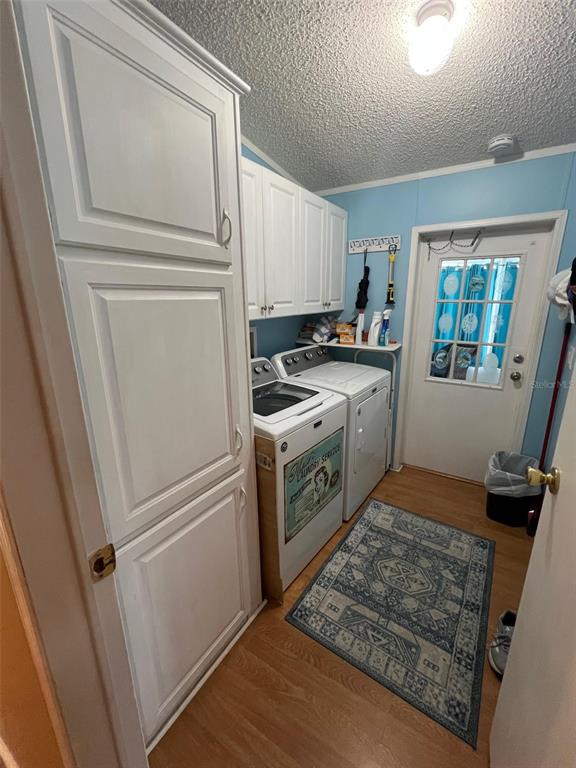 1001 Starkey Road, Unit 758 Largo, FL 33771 - Photo 22 of 37 a kitchen with a refrigerator stove and sink
