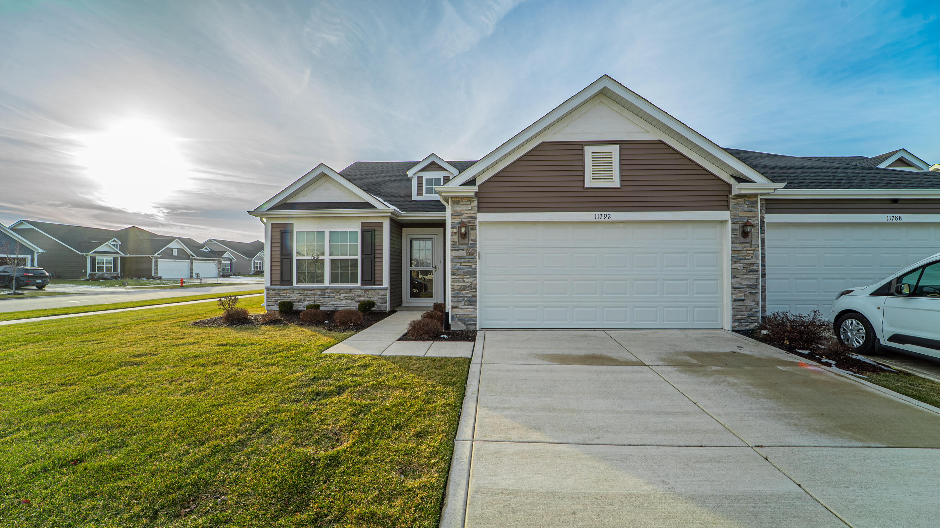 11792 Rhode Island Street Crown Point, IN 46307 - Photo 1 of 30 a front view of a house with swimming pool