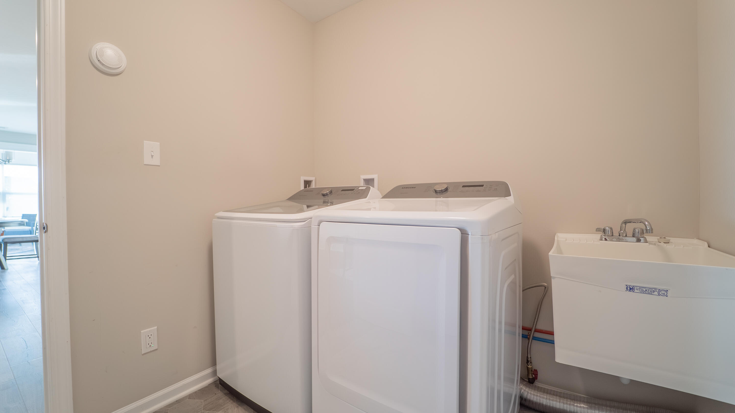 11792 Rhode Island Street Crown Point, IN 46307 - Photo 27 of 30 a utility room with dryer and washer