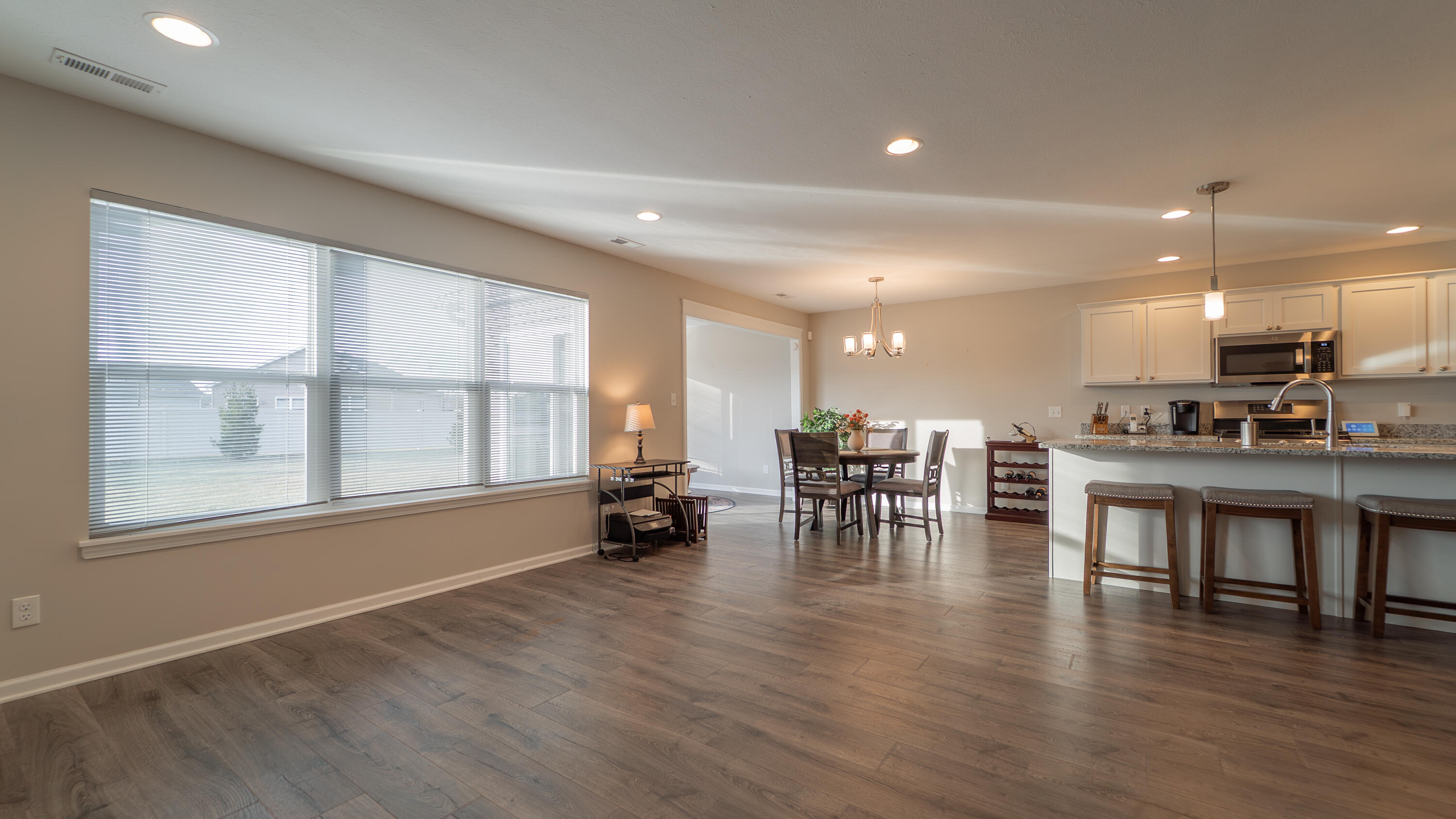 11792 Rhode Island Street Crown Point, IN 46307 - Photo 7 of 30 a view of kitchen with dining table and chairs