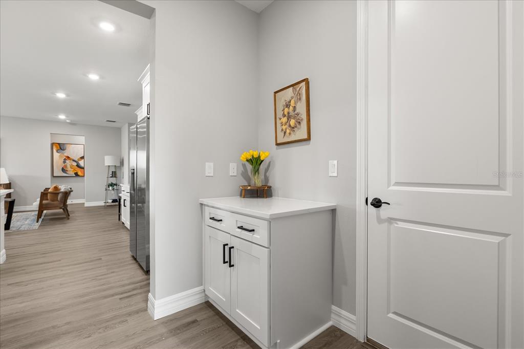 14367 English Sparrow Road Brooksville, FL 34614 - Photo 23 of 30 a view of kitchen with furniture and wooden floor