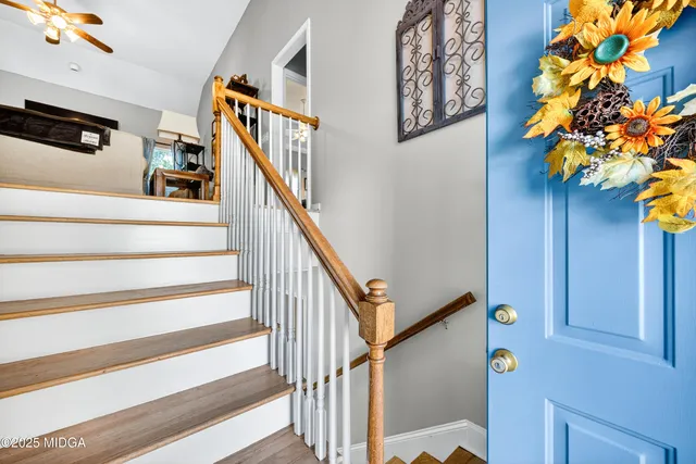 a view of entryway with a front door