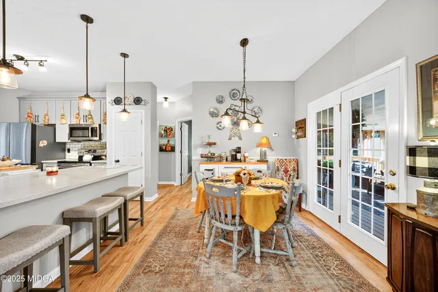 a view of a kitchen and dining room