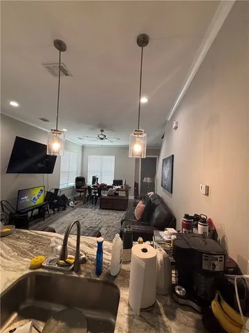 a room with furniture and a flat screen tv