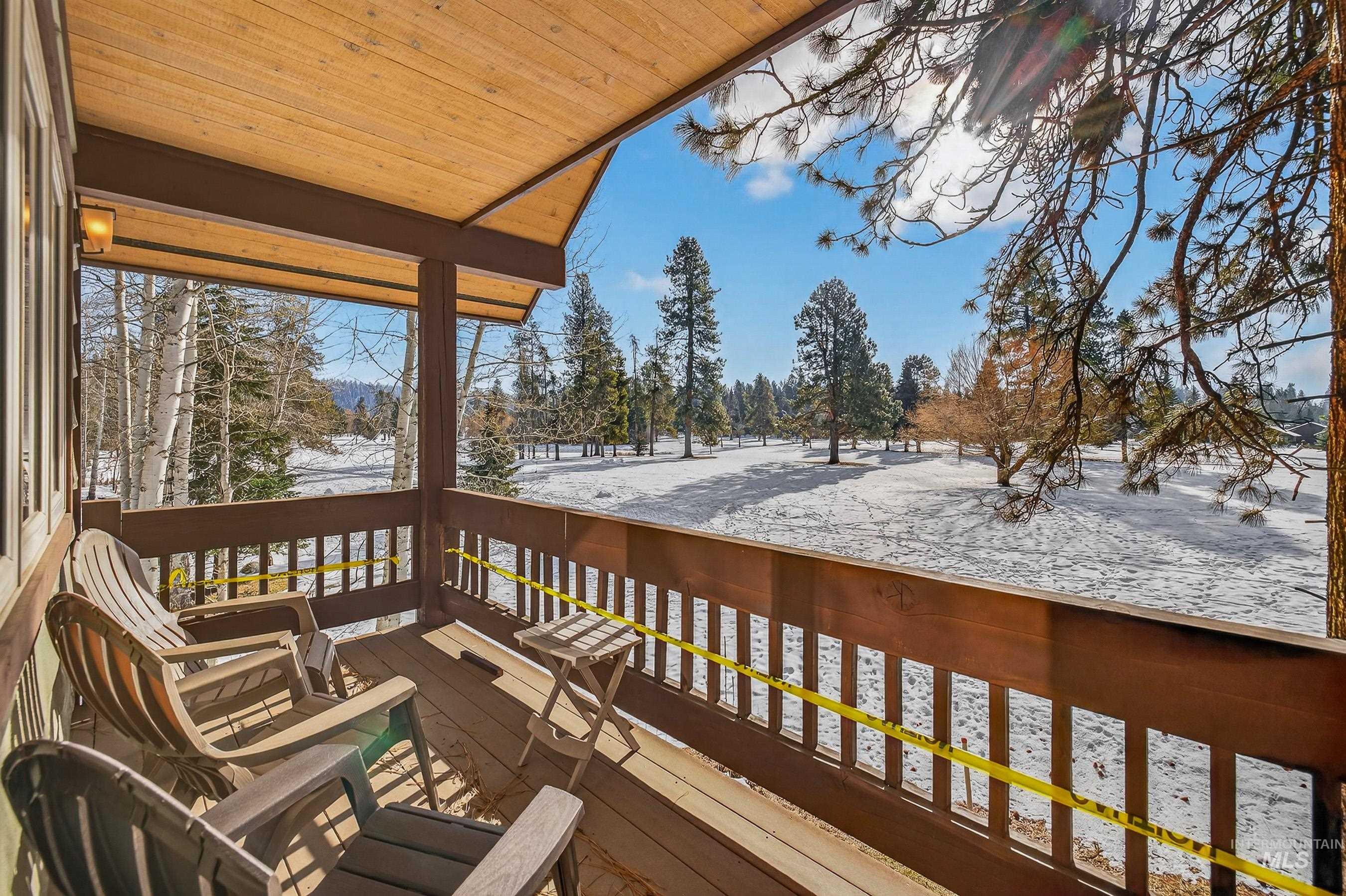 722 Lick Creek Road, Unit 8 McCall, ID 83638 - Photo 36 of 50 Snow covered deck with a balcony