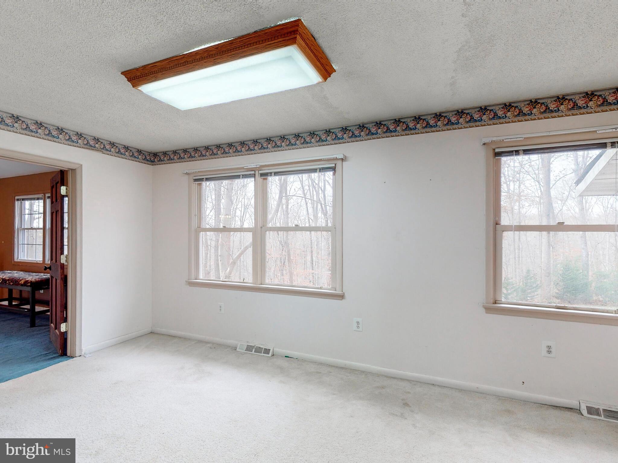 3121 Tucker Road Street, MD 21154 - Photo 34 of 50 upper level primary suite sitting room