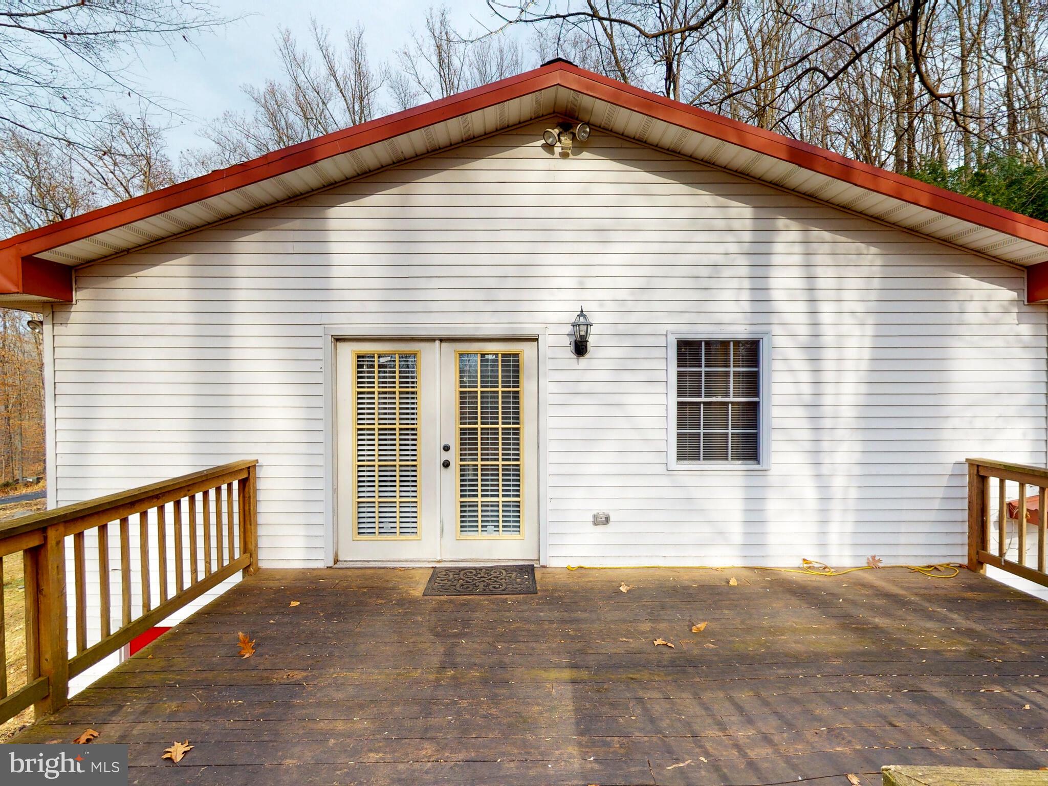 3121 Tucker Road Street, MD 21154 - Photo 43 of 50 upper level deck off primary suite