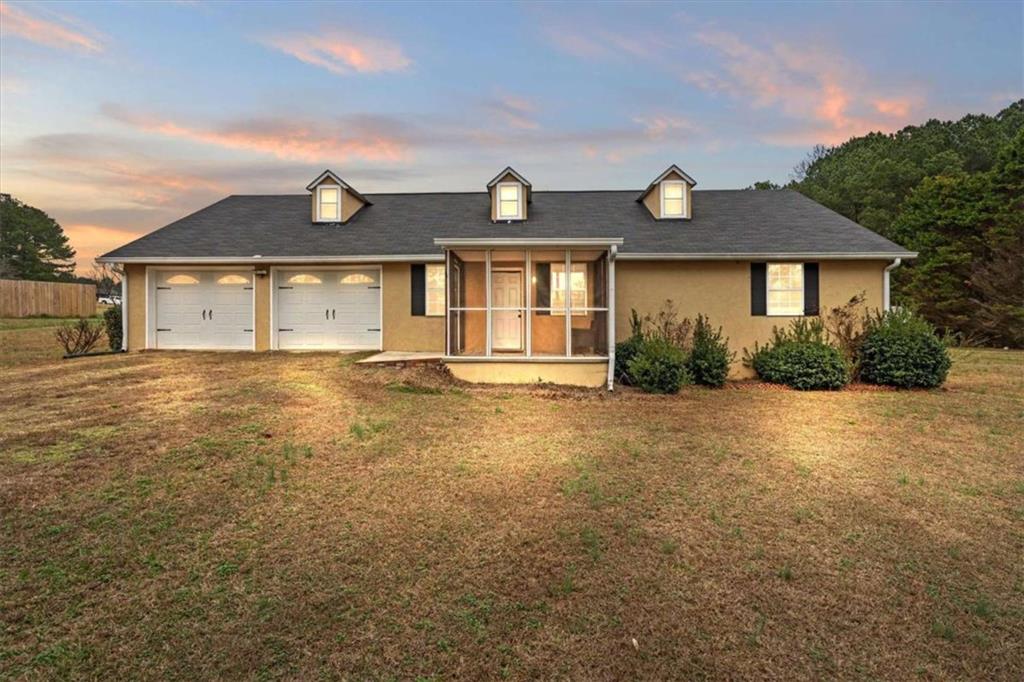 40-l Z L Z Jackson Road Bowdon, GA 30108 - Photo 18 of 25 front view of a house with a yard