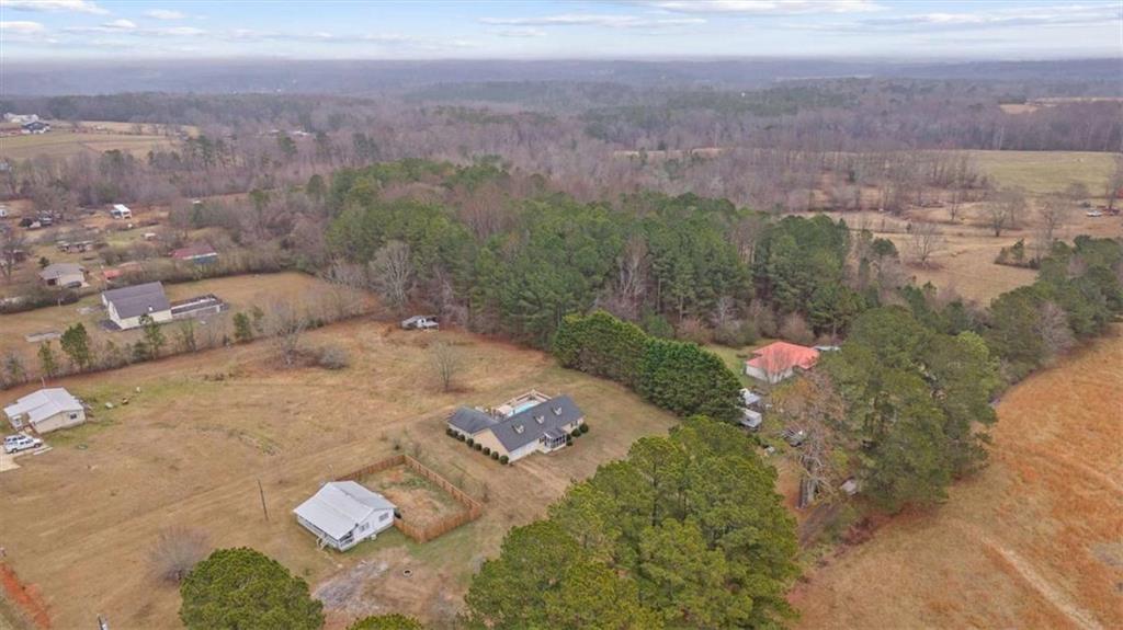 40-l Z L Z Jackson Road Bowdon, GA 30108 - Photo 22 of 25 a view of a lake with a mountain in the background