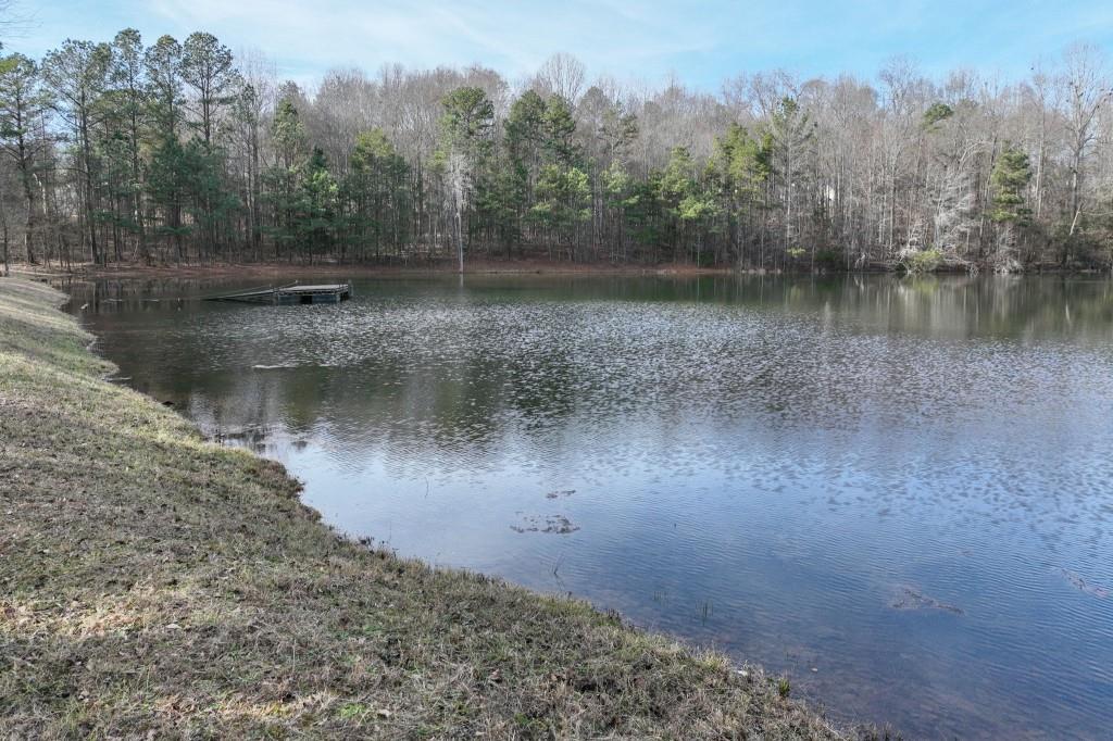 Lot 12 Rolling Ridge Drive Gillsville, GA 30543 - Photo 16 of 18 a view of a lake view with a of house in the background