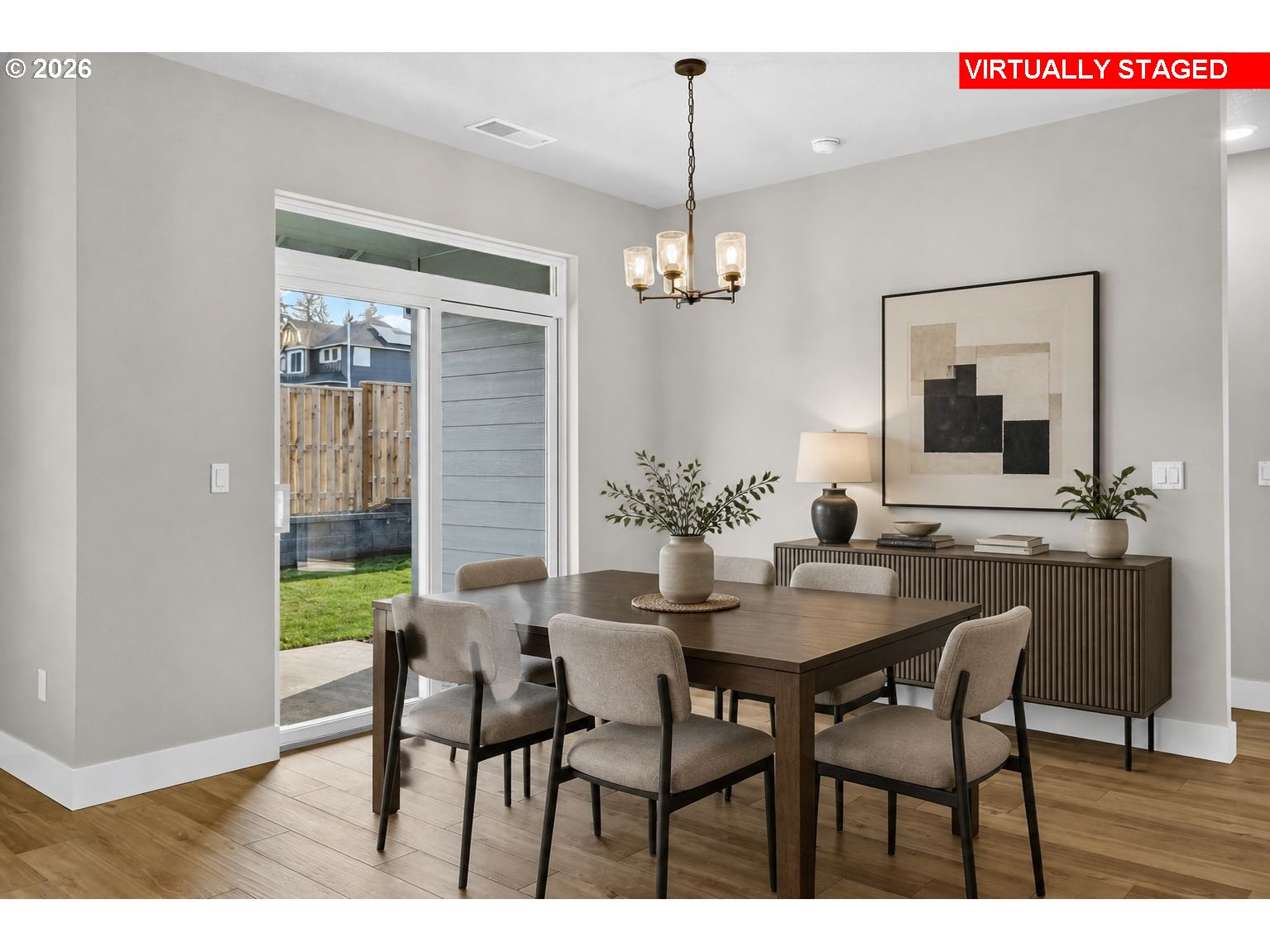 3352 Northeast Sweetwater Road, Unit 80 Estacada, OR 97023 - Photo 11 of 48 a view of a dining room with furniture and a chandelier