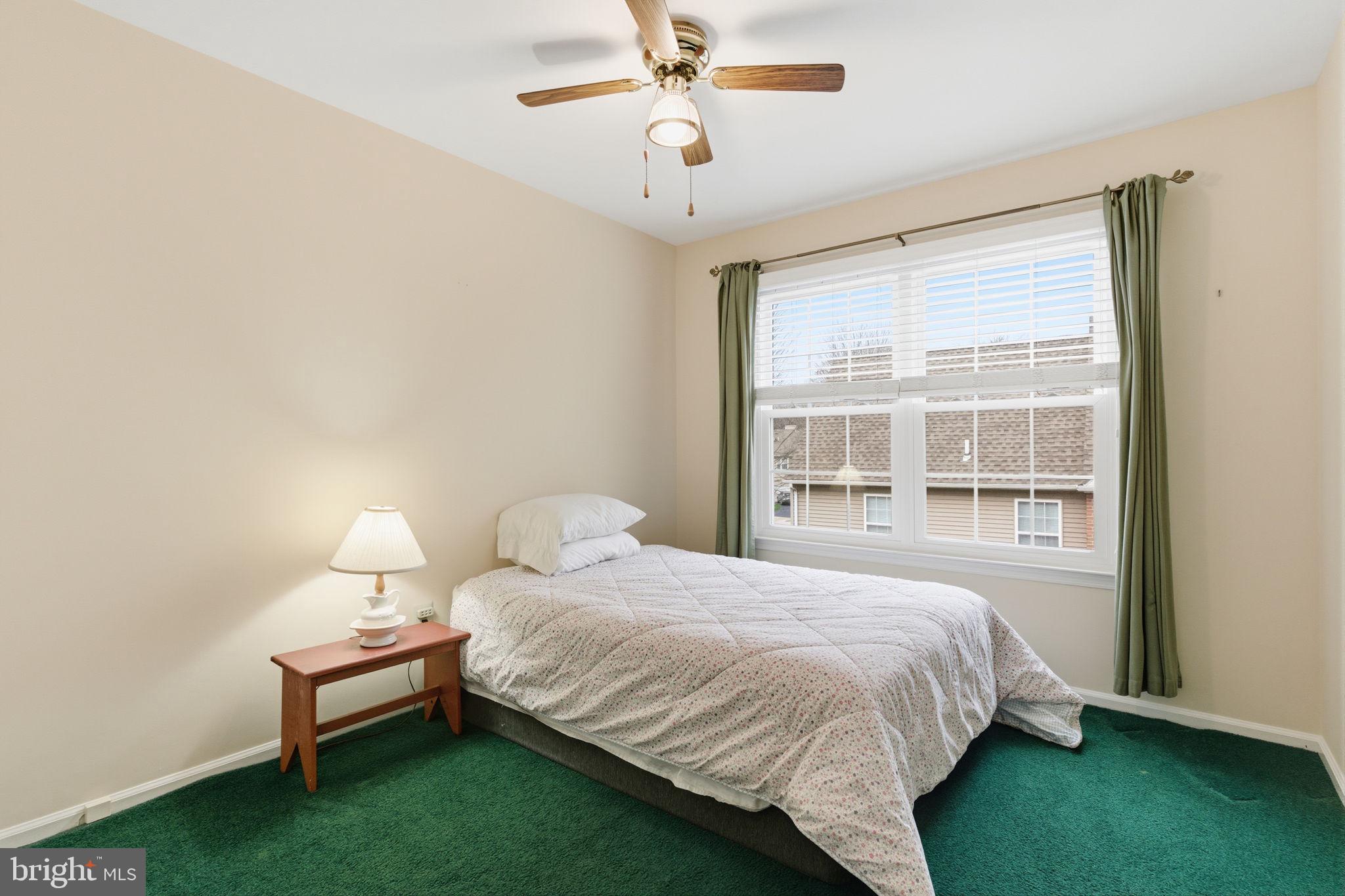 100 Bishops Gate Lane Doylestown, PA 18901 - Photo 12 of 33 a bedroom with a bed and a window
