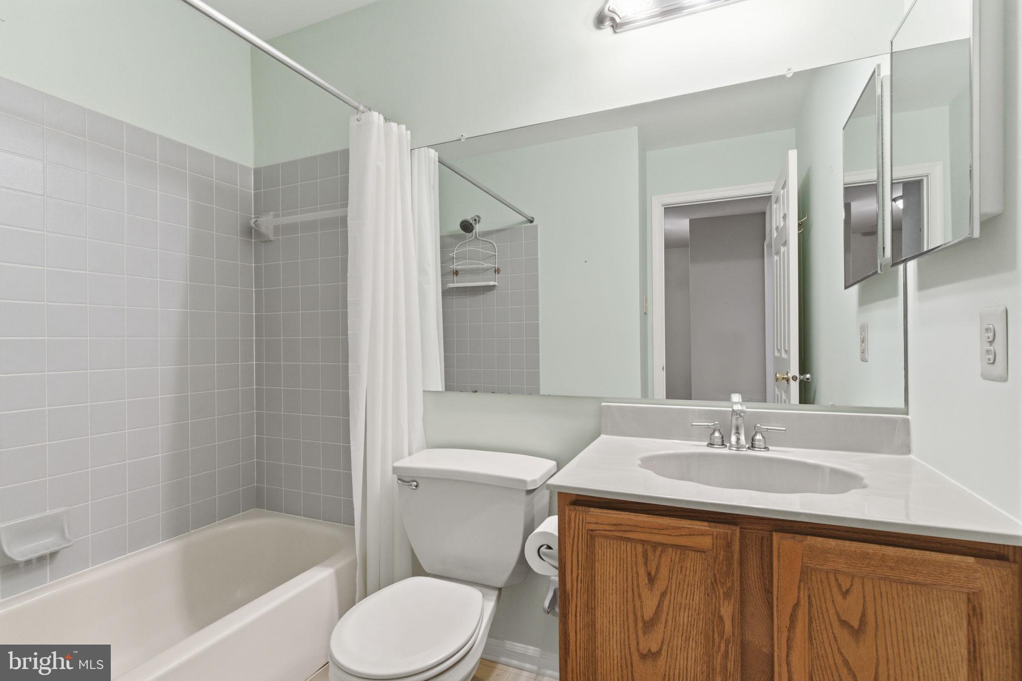 100 Bishops Gate Lane Doylestown, PA 18901 - Photo 13 of 33 a bathroom with a sink toilet and shower