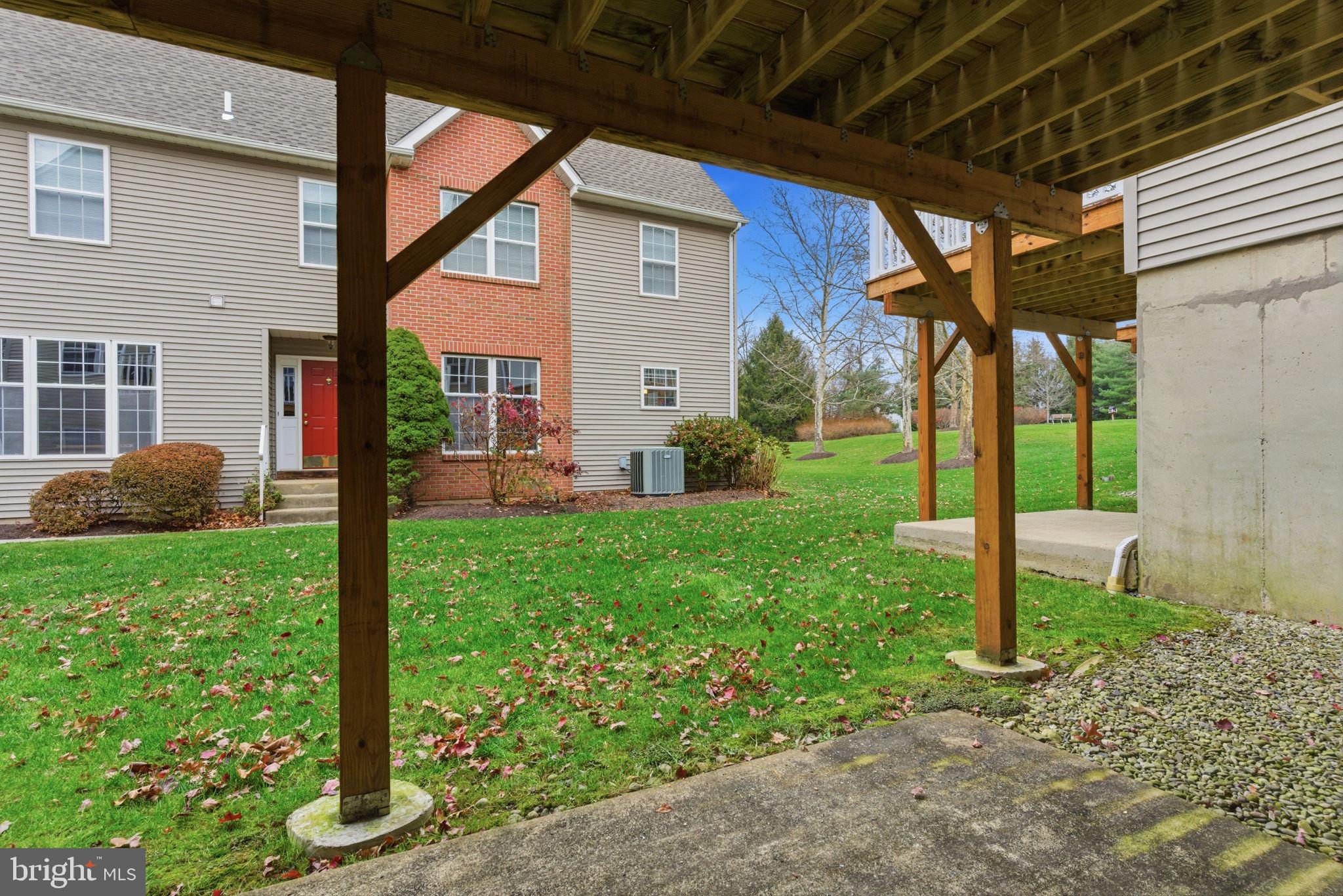 100 Bishops Gate Lane Doylestown, PA 18901 - Photo 31 of 33 a view of a porch with a backyard