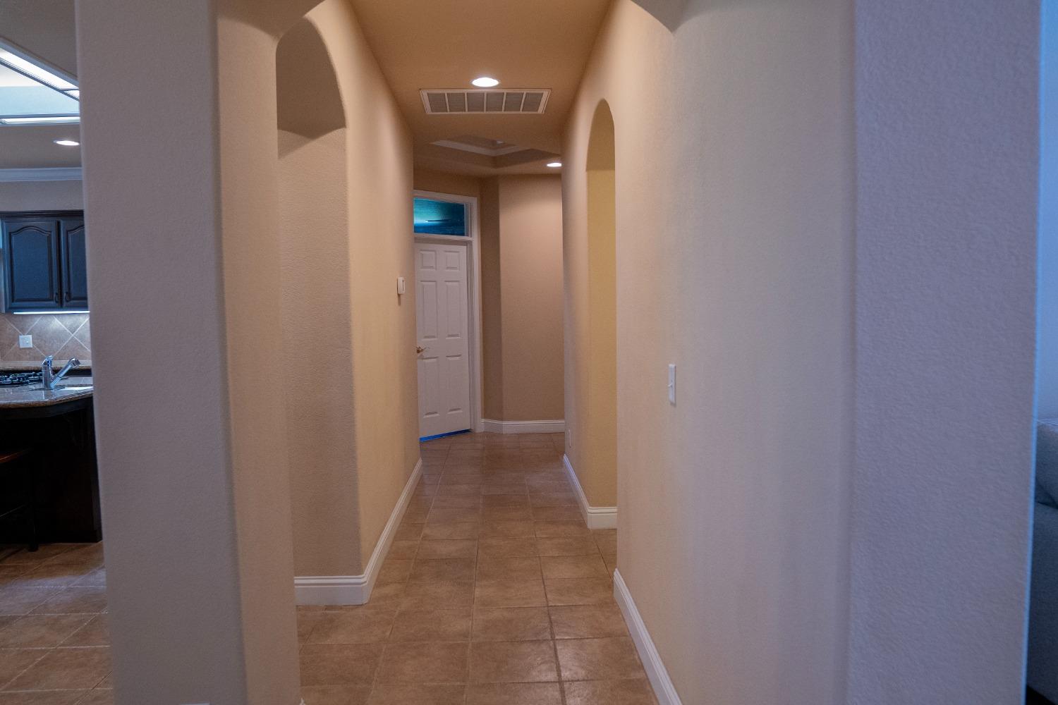2607 Norwich Avenue Clovis, CA 93611 - Photo 21 of 55 a view of a hallway with a white walls