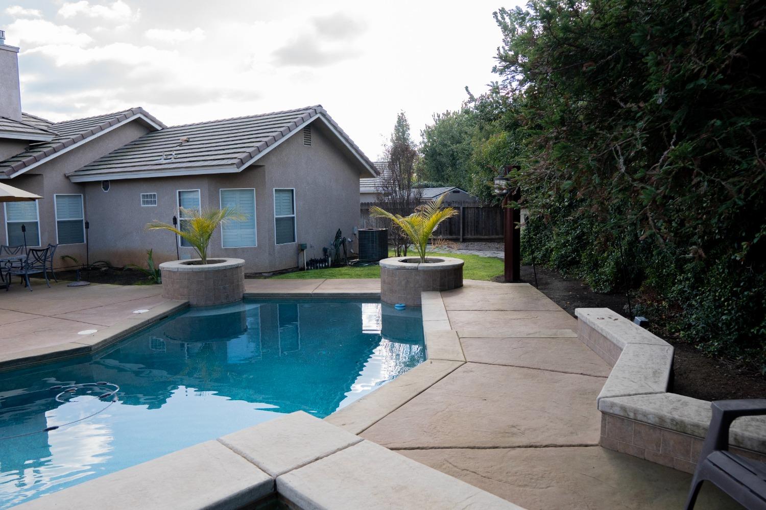 2607 Norwich Avenue Clovis, CA 93611 - Photo 44 of 55 a view of a house with backyard and sitting area