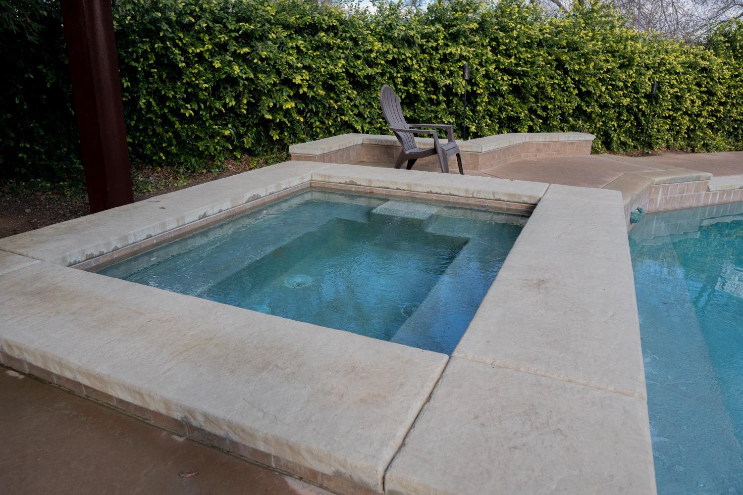 2607 Norwich Avenue Clovis, CA 93611 - Photo 47 of 55 a view of a swimming pool with a yard