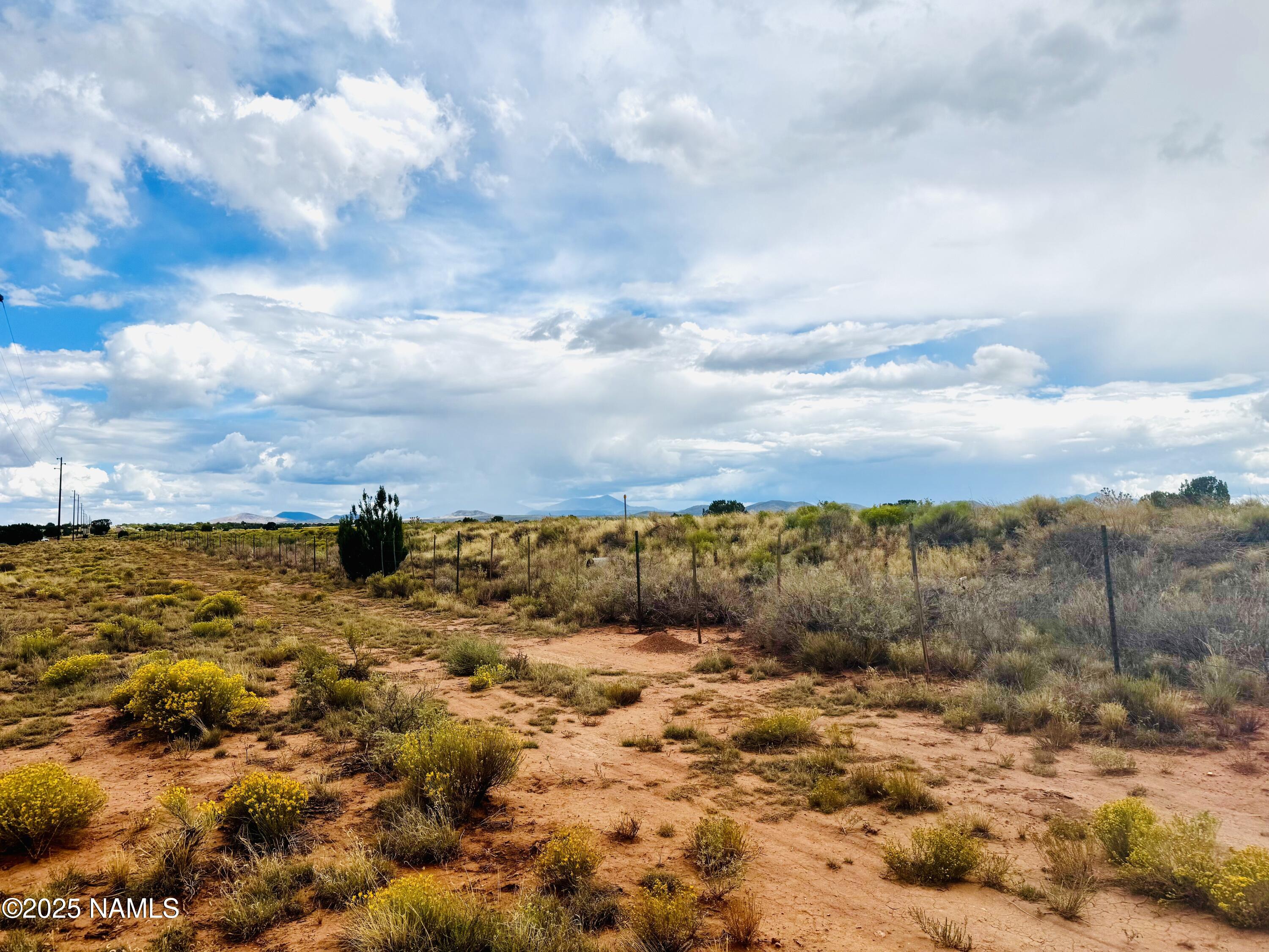 2819 East Lynwood Road Williams, AZ 86046 - Photo 9 of 9 a view of a yard with wooden fence
