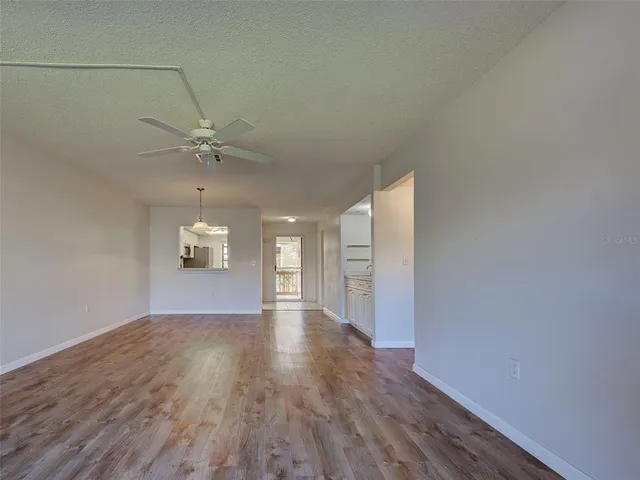 a bathroom with a sink a shower and a mirror