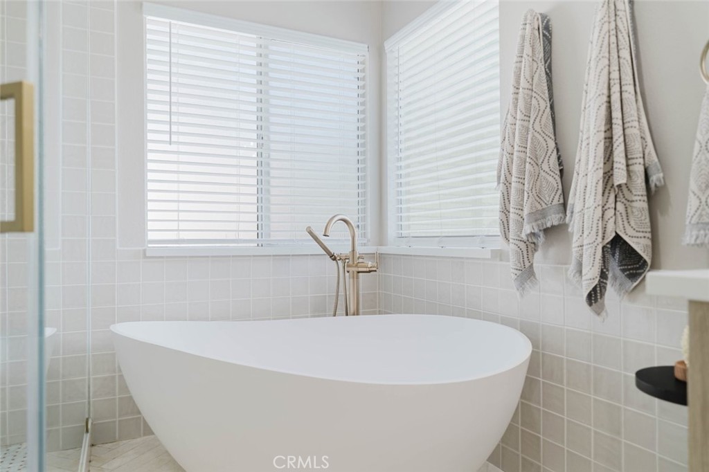 32480 The Old Road Castaic, CA 91384 - Photo 48 of 68 a white bath tub sitting in a bathroom