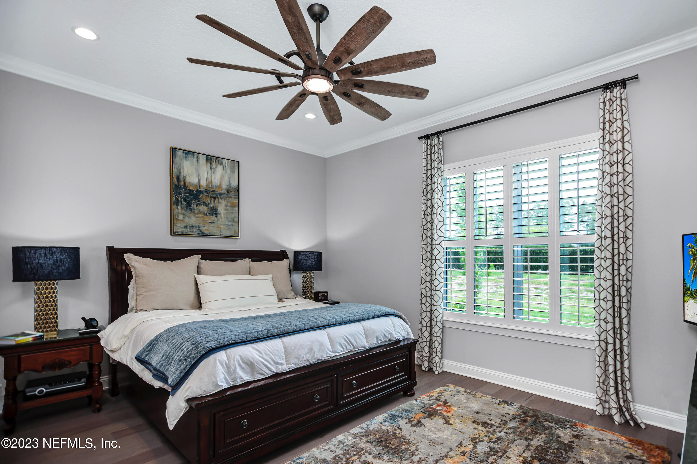 67 Carousel Drive Ponte Vedra, FL 32081 - Photo 13 of 30 a bedroom with a bed dresser and a window