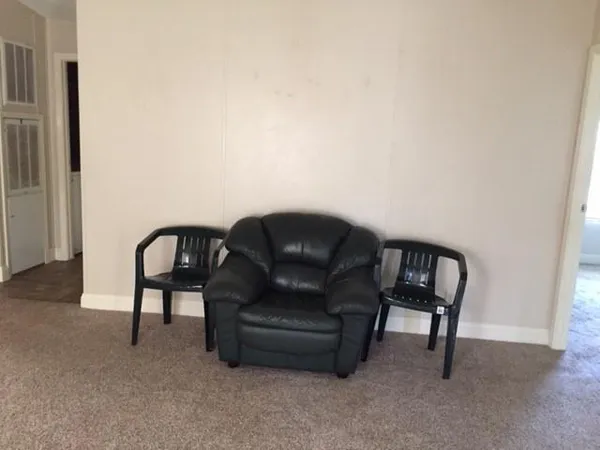 a chair and a table in a room