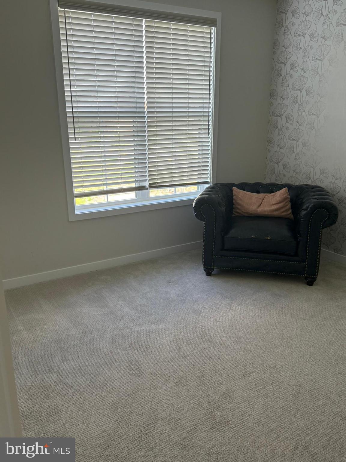 22351 Roanoke Rise Terrace Ashburn, VA 20148 - Photo 11 of 28 a living room with furniture and a window