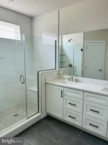 a bathroom with a toilet and a sink