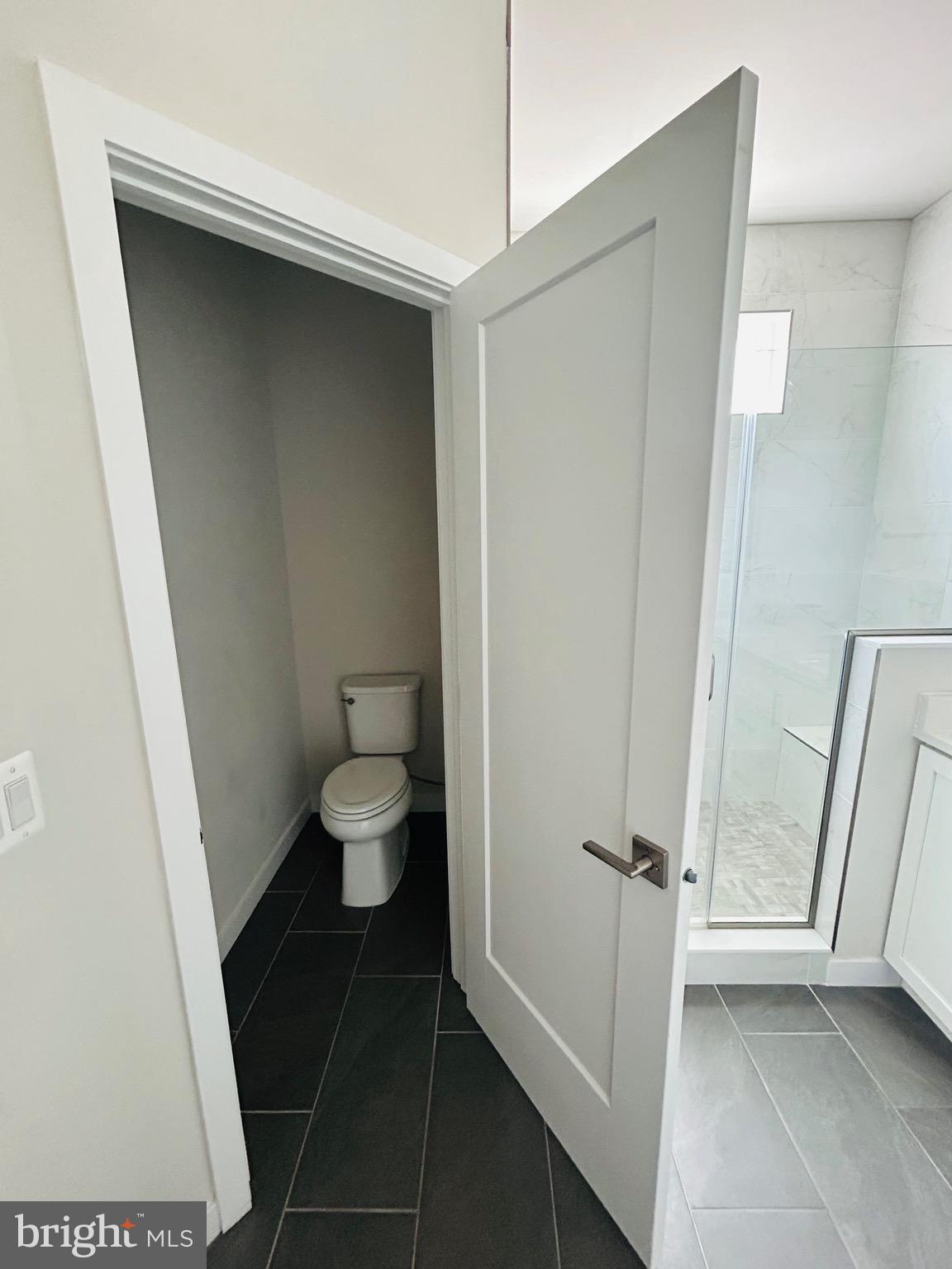 22351 Roanoke Rise Terrace Ashburn, VA 20148 - Photo 16 of 28 a bathroom with a toilet and a sink