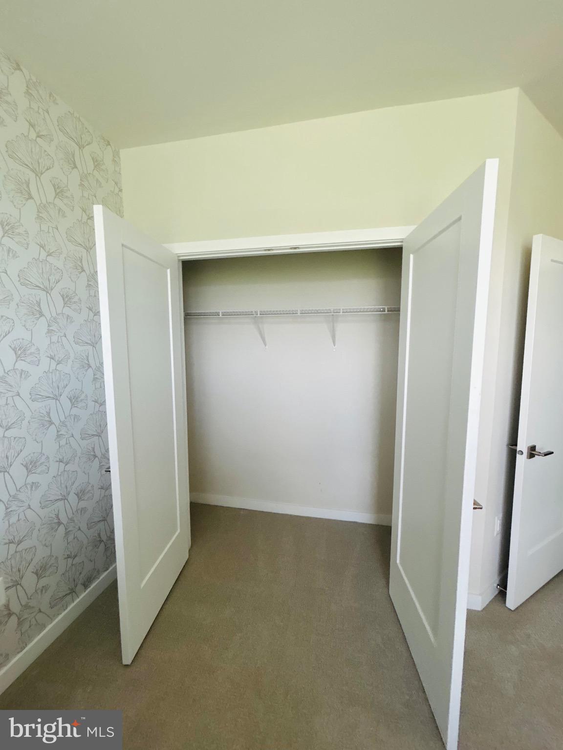 22351 Roanoke Rise Terrace Ashburn, VA 20148 - Photo 24 of 28 an empty room with a bench