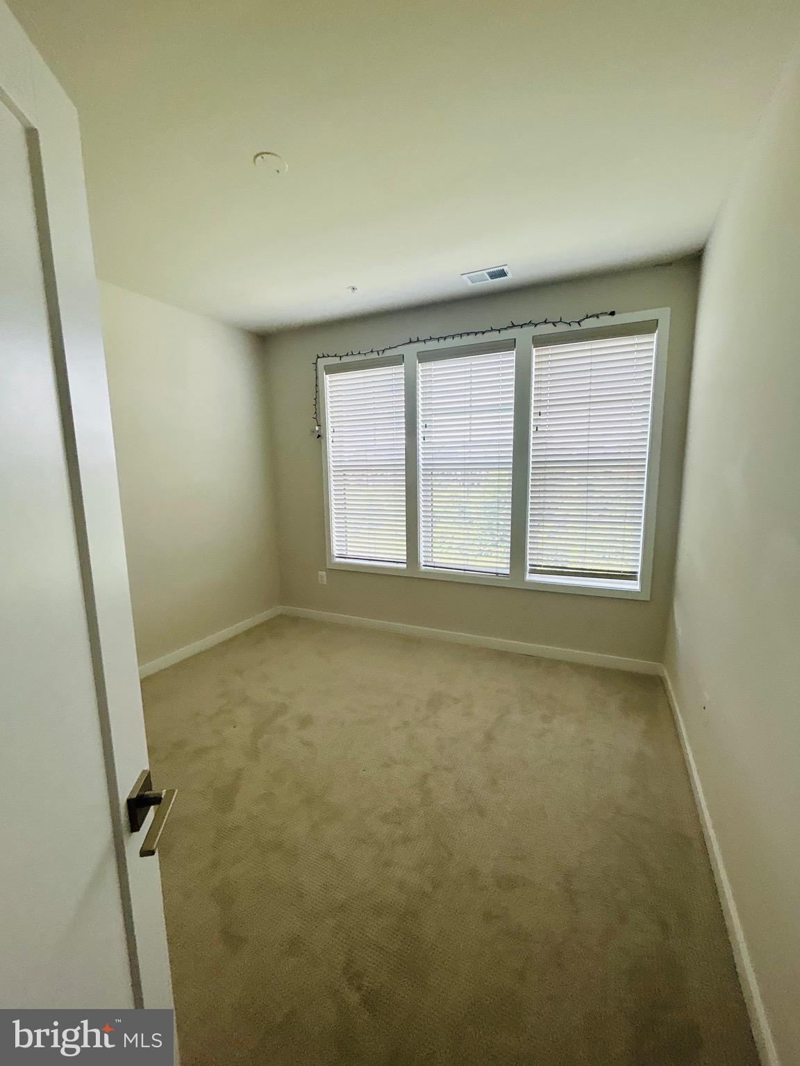 22351 Roanoke Rise Terrace Ashburn, VA 20148 - Photo 25 of 28 a view of an empty room with a window