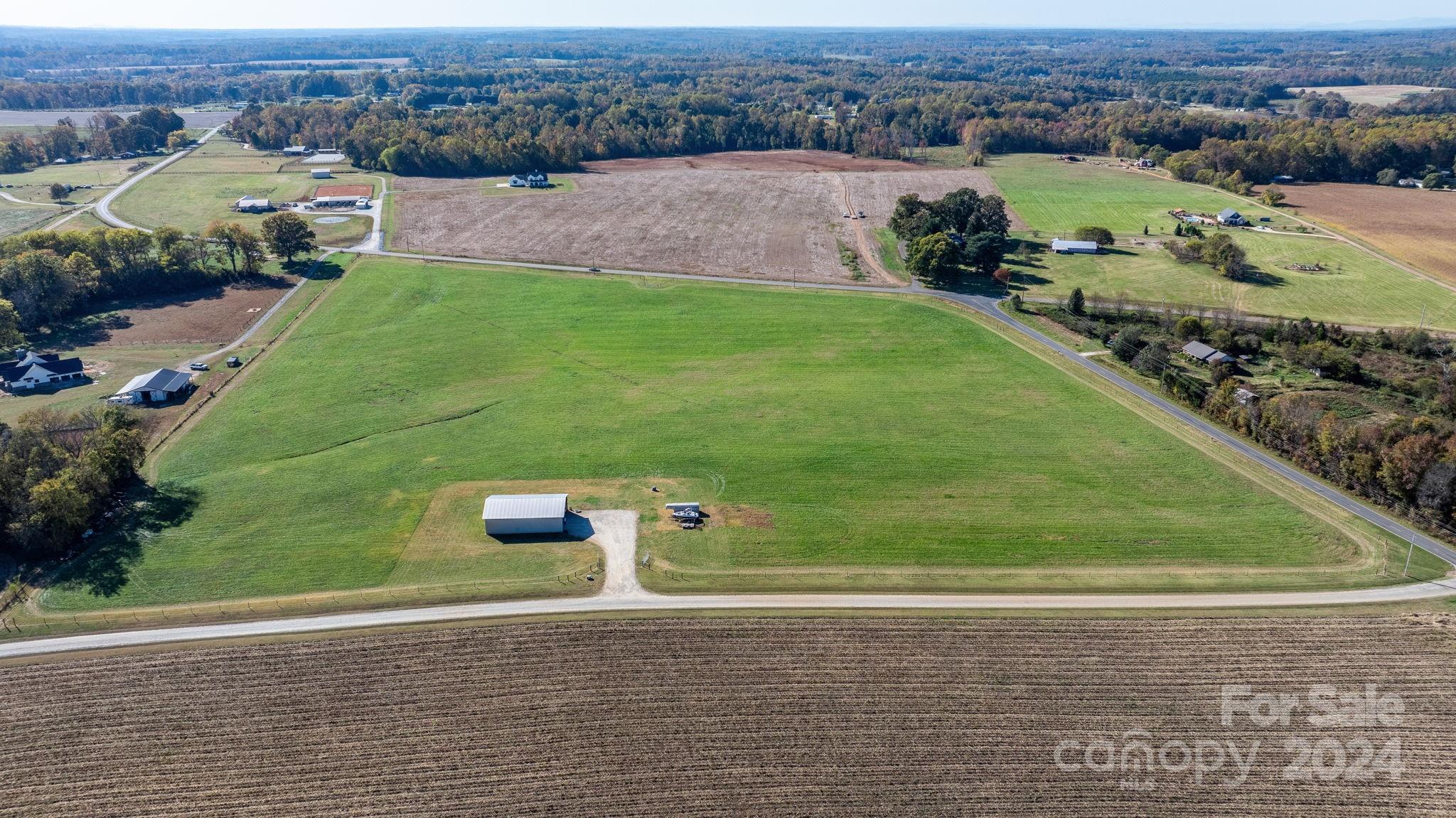Lot 4 Foster Road Cleveland, NC 27013 - Photo 14 of 22 an aerial view of a house with a yard