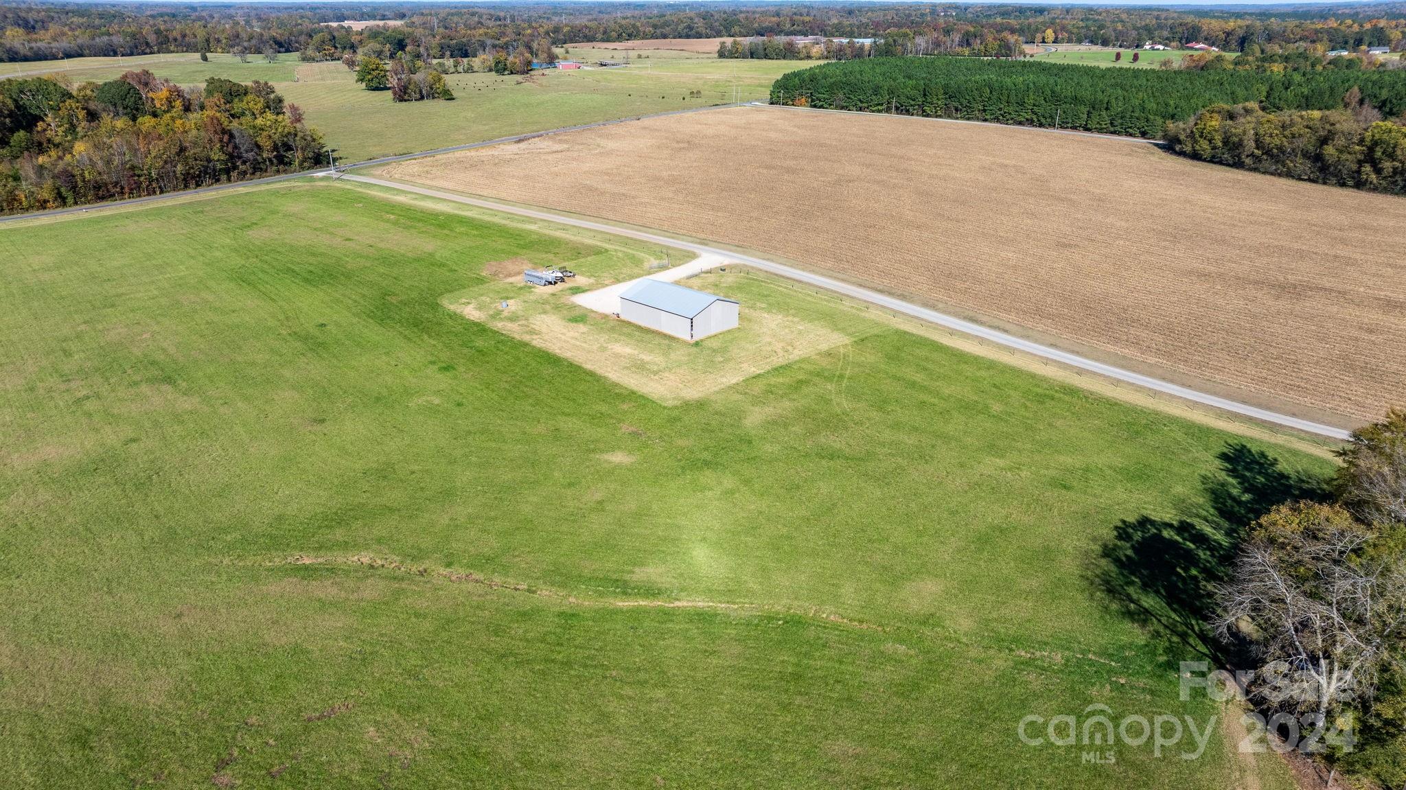 Lot 4 Foster Road Cleveland, NC 27013 - Photo 15 of 22 a view of a big yard with potted plants