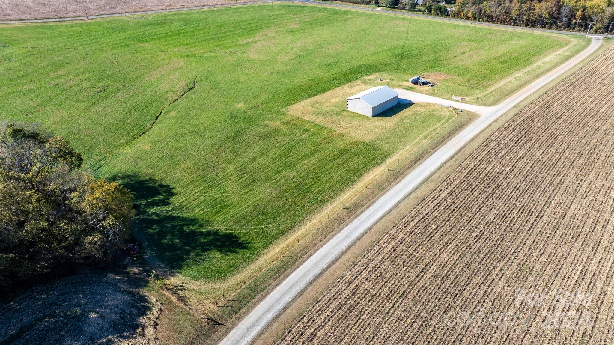 Lot 4 Foster Road Cleveland, NC 27013 - Photo 16 of 22 a view of a two chairs in the backyard