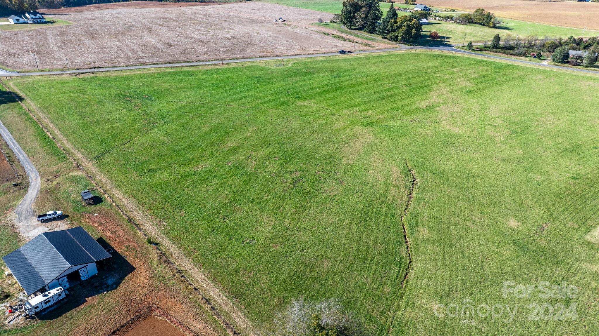 Lot 4 Foster Road Cleveland, NC 27013 - Photo 19 of 22 a view of an outdoor space and a yard
