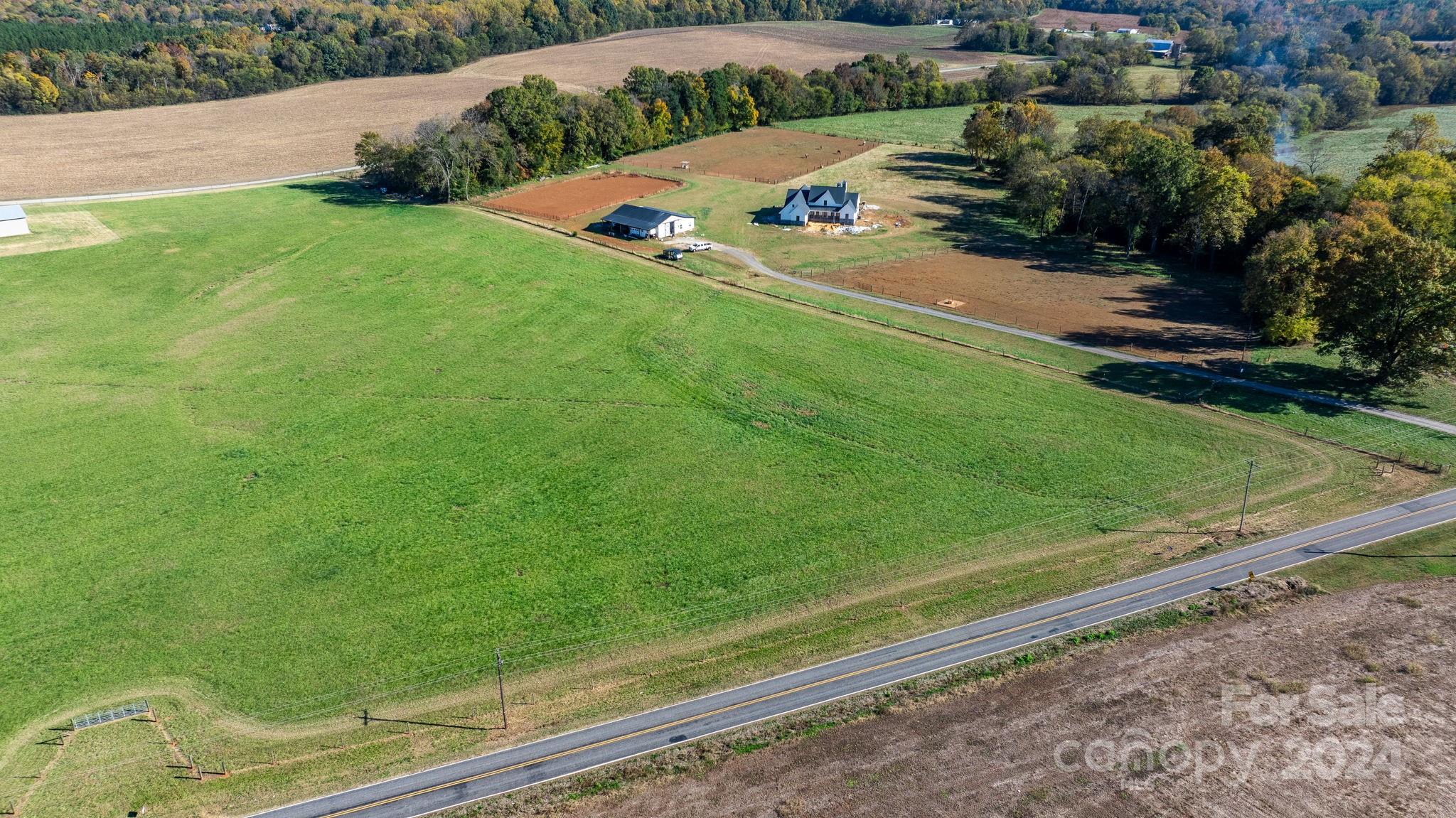 Lot 4 Foster Road Cleveland, NC 27013 - Photo 21 of 22 a view of an outdoor space and a yard